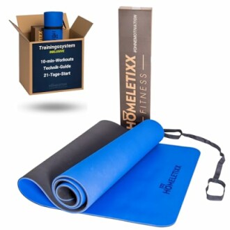Blau-schwarze Yogamatte mit Trainingssystem und Transportbox.