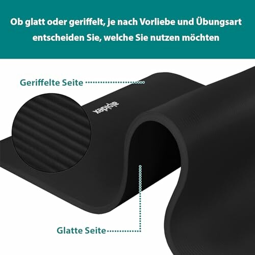 Schwarze Yogamatte mit glatter und geriffelter Seite